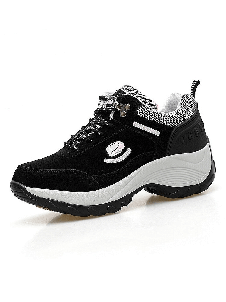 Black suede women's sports sneakers with faux fur, non-slip laces, and mid-heel design for warm, stylish wear.